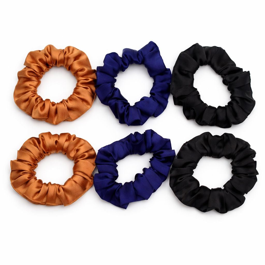 Premium satin hair scrunchie designed for smooth, crease-free styling