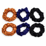 Premium satin hair scrunchie designed for smooth, crease-free styling