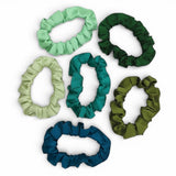 Designer satin scrunchie with soft sculpted silhouette
