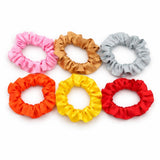 Elegant satin scrunchie with refined elastic structure
