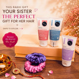 Rakhi gift hamper for women in India featuring travel-size shampoo, conditioner, co-wash and two satin scrunchies.